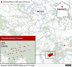 Wildfire raging south of Paris could have been set deliberately, says minister