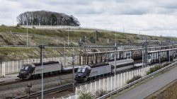 Bus hits train stopped on French side of  Channel Tunnel, with 19 injured