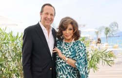 Dame Joan Collins forced to talk down 'fuming' husband in supermarket clash