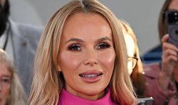 Amanda Holden flashes incredible body at NTAs in jaw-dropping shredded dress