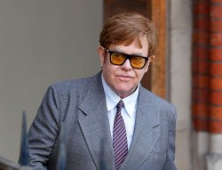 Elton John just let Prince Harry know exactly whose side he's on