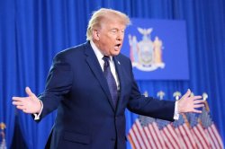 Donald Trump tells protester 'go home to mom' at rally and says hecklers to get 'whacked'
