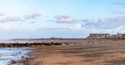 Woman dies and man left fighting for life after pair enter sea to save dog in Lancashire