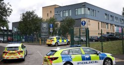 Girl, 14, charged with attempted murder after triple stabbing at Manchester high school