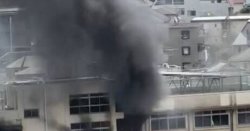 Tokyo school fire: Children cling to window ledge as blaze engulfs primary school in Japan