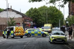 Urgent manhunt after person shot inside Liverpool café before armed police swoop