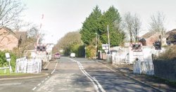 One person dies and child in hospital as train hits car in Lancashire