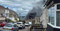 Swansea fire LIVE: Huge blaze near city centre as smoke seen for miles above Bay