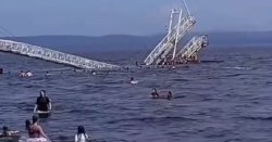 Horror as bridge collapses throwing 20 people into sea - children injured