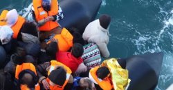 Smuggler snared piloting small boat migrants across Channel thanks to Christmas jumper