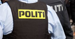 Three shot including officer as police descend on Danish city after fire erupts