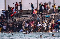 'Legal loophole' exposed after migrant surge leaves Spanish enclave in chaos