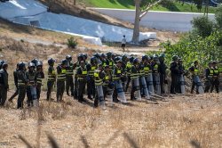 More than 100 migrants 'clash with police as they try to reach Ceuta'