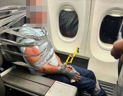 American Air<b class='text-danger'>lines</b> passenger duct-taped to seat after violent tirade sparks mid-air panic