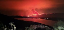 Horror as British tourists jump into sea to escape holiday island engulfed by inferno