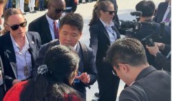 White House chaos as Chinese and US reporters 'brawl' in 'heated' clash
