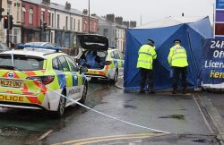 Police tape off scene near Aldi supermarket in Bolton as 999 crews scrambled