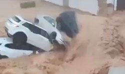 Horror as huge flood flips cars and rips through Spain holiday hotspot filled with Brits