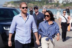 Prince Harry's telling reaction after Meghan 'spotted on jolly' while he works