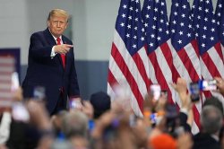 Donald Trump calls heckler a 'spoiled child' in on-stage outburst at key rally