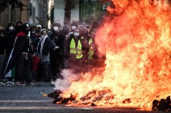 France riots: Chaos erupts across country as barricades ablaze and police 'fire tear gas'