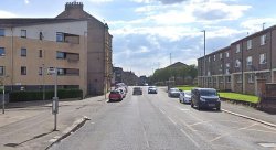 Tragedy as woman dies after fire erupts in building near Glasgow