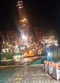 Terrifying moment huge oil rig sinks with 115 on board sparking desperate search