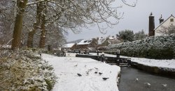 The charming UK village with cute cottages perfect for a festive Boxing Day walk