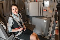 Passengers are only just discovering why flight attendants sit on their hands for landing