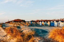 Quaint seaside village with bustling high street and cosy pubs is perfect for autumn