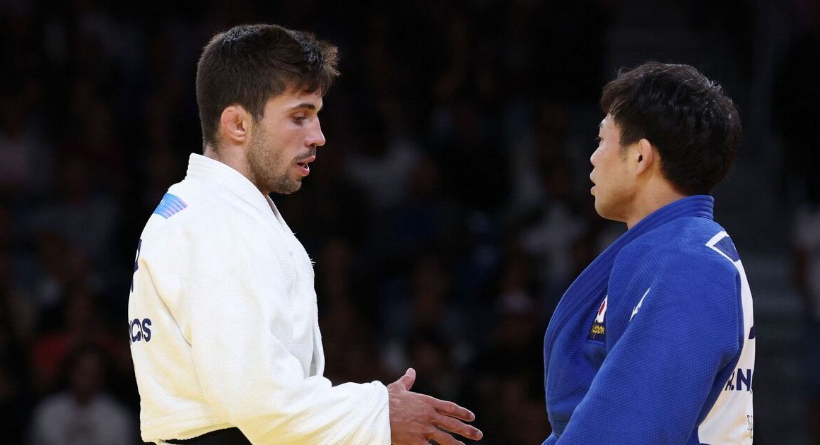 Olympic judo fight turns sour as star refuses to leave mat and snubs handshake | Other | Sport